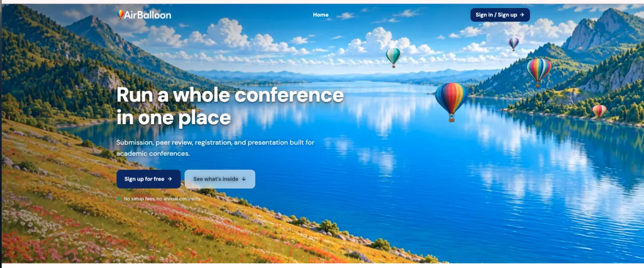 AirBalloon homepage: hot-air balloons over a mountain lake